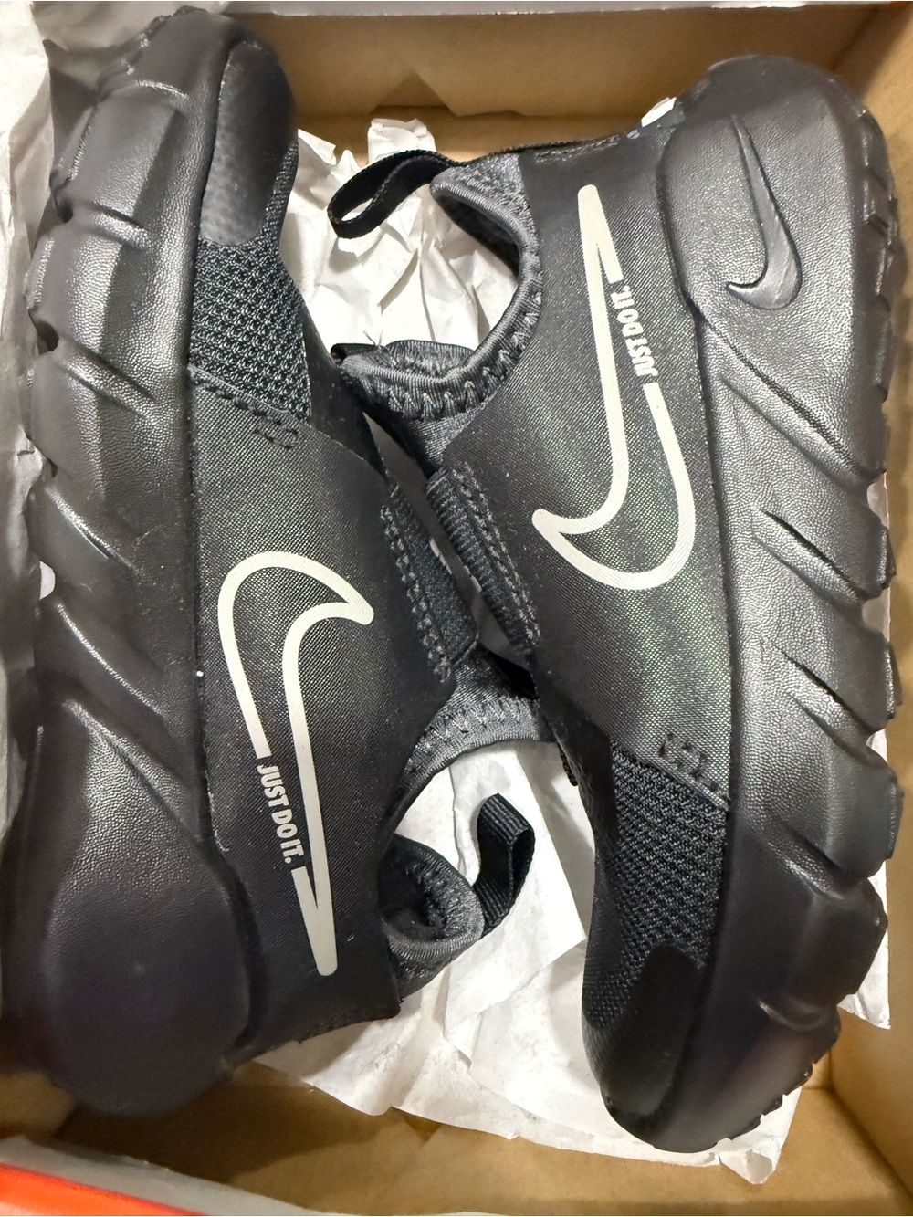 Nike Black Kids' Slip-On Sneakers with Silver Swoosh